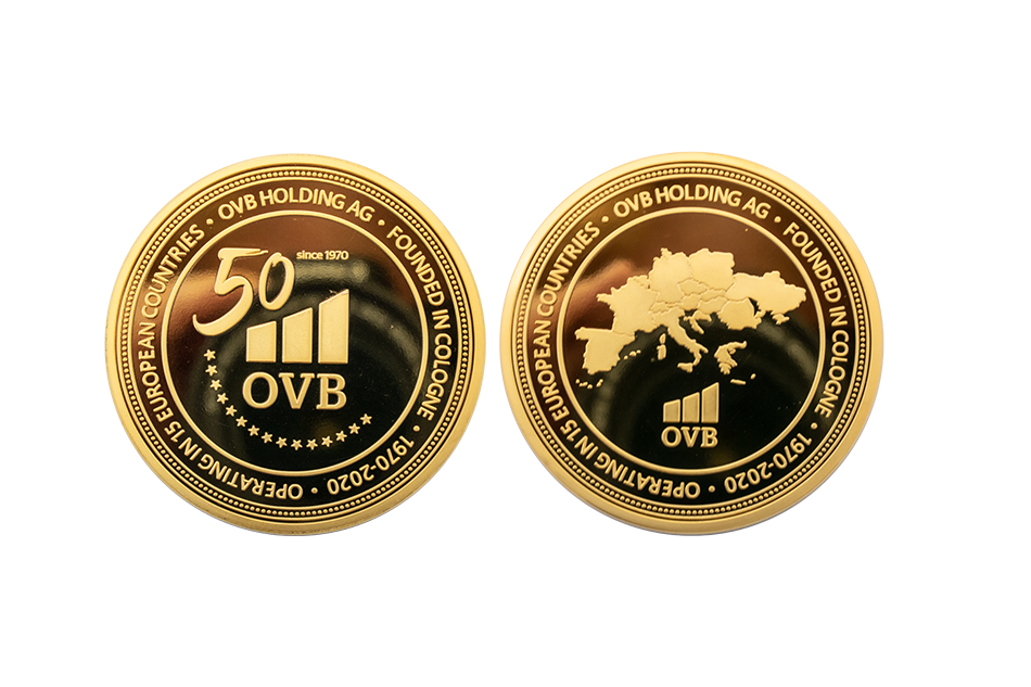 Custom Anniversary Coins made from Gold. 50 Years Anniversary.OVB Holding Coins