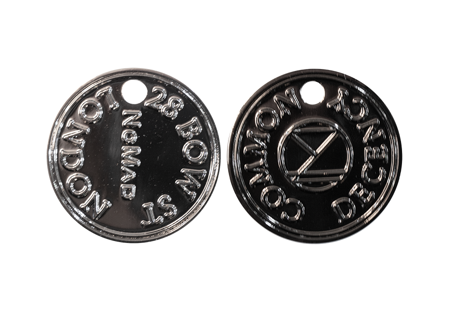 Custom Coins with a hole. Black Nickel Coins in Polished Finish