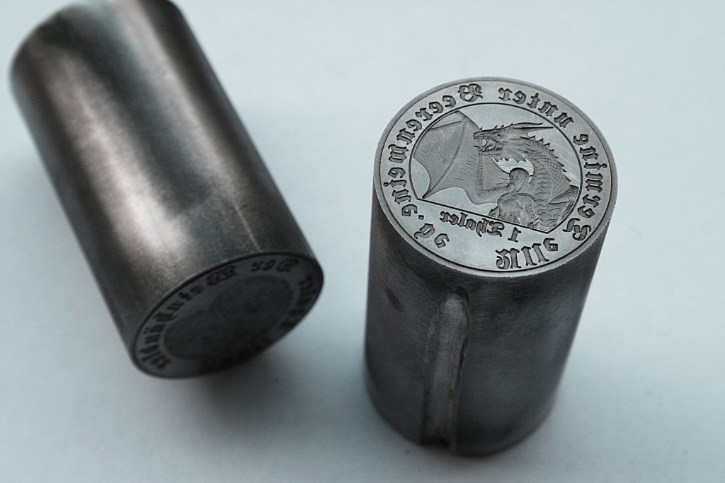 Custom-made coin die from steel. custom-minted coins