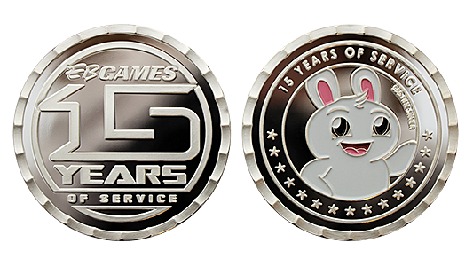 Custom coins for anniversaries_ individual embossed coins with enamel colors and wave cut edges