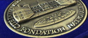 Big 3D Die-Cast Antiqued School Coins with high relief, showing the university building